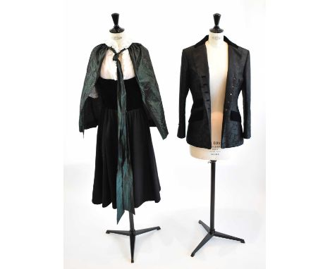 SUSANNE SPATT, SALZBURG; a traditional four piece Austrian costume comprising green velvet and black pinnafore dress, white b