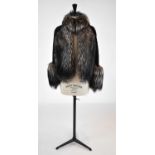 LOEWE; a short black Persian lamb jacket with silver fox fur trim, size small.