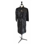 OSCAR DE LA RENTA; a black short fur full length evening coat, size small.