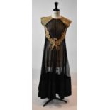 RIDHI MEHRA; a black and silk taffeta full length evening dress with gold embroidered
