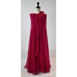 GUCCI; a fuscia pink 100% silk full length strapless evening dress, size 42. Condition Report: