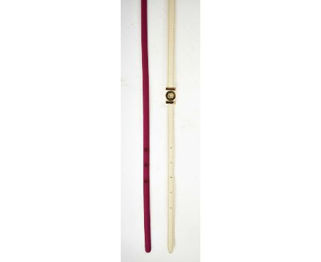 GUCCI; a fuschia pink satin slim belt, size 42 and an Elie Saab cream leather slim belt with gold logo, size 38.