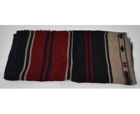 RUBINACCI; a red, blue and cream 100% cashmere scarf with fringing.
