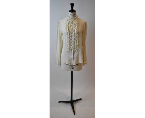 DOLCE GABBANA; a cream 100% silk blouse with frills, size 40.