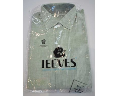 LORO PIANA; a light green linen long sleeve shirt, size M.Condition Report: Dry cleaned.