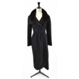 CHRISTIAN DIOR; a black wool mix full length coat with mink collar, size 8.