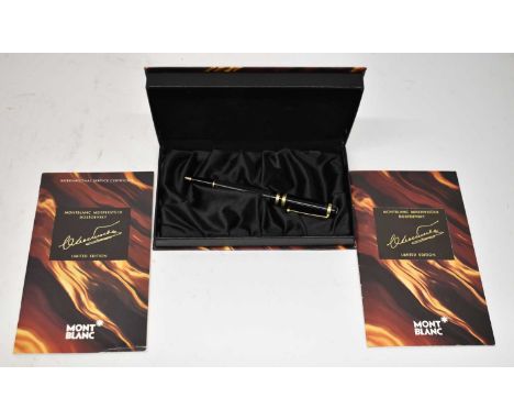 MONT BLANC; a black limited edition Meisterstck Dostoevsky pen with gold trim and a blue cabochon, in original box with paper