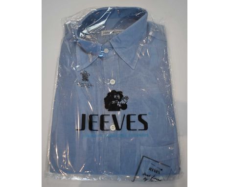 MARIANO RUBINACCI; a blue cotton long sleeve button down shirt, size approx 15.5".Condition Report: Dry cleaned.