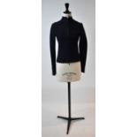 ALAIA; a navy blue and black short length patterned jacket, size 36.