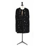 ELIE SAAB; a black 100% shearling floral cape, size 36.