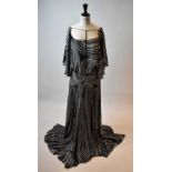 JENNY PACKHAM; a black and white 100% silk geometric design full length evening dress, size 6.