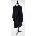 A navy blue and black striped fur and silk long length coat with detachable scarf, size small.