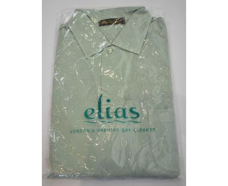 LORO PIANA; a light green cotton short sleeve polo shirt, size XL.Condition Report: Dry cleaned.