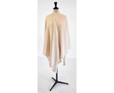 CLUB MONACO; a cream 100% cashmere shawl, one size.Condition Report: There are no small holes on this scarf.
