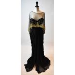 ZUHAIR MURAD; a black 100% silk full length strapless evening dress with gold beaded lace cape, size