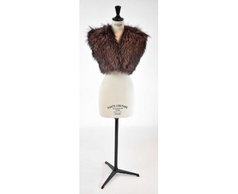 CELINE; a pink fox fur short gilet, size 38.