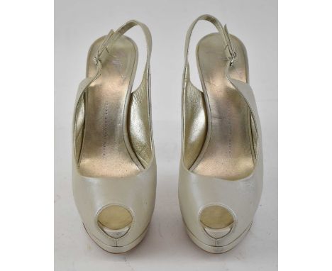 GIUSEPPE ZANOTTI; a pair of gold leather platform stiletto peep toe sling backs, heal 15cm, size 38.