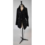 LOUIS VUITTON; a black belted jacket, size 34.