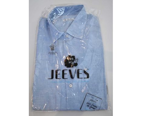 LORO PIANA; a light blue linen long sleeve shirt, size M.Condition Report: Dry cleaned.