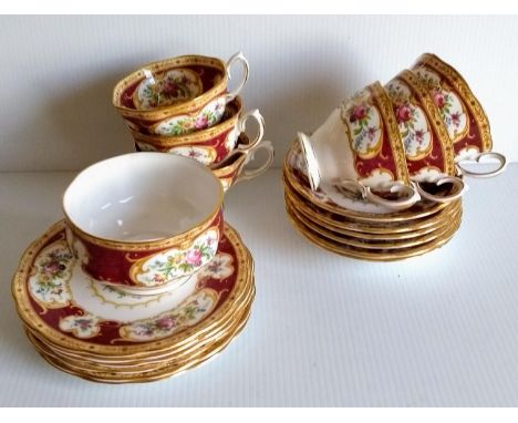 A 19-piece Royal Albert 'Lady Hamilton' tea service. Condition: repair to one cup, otherwise without damage or repair