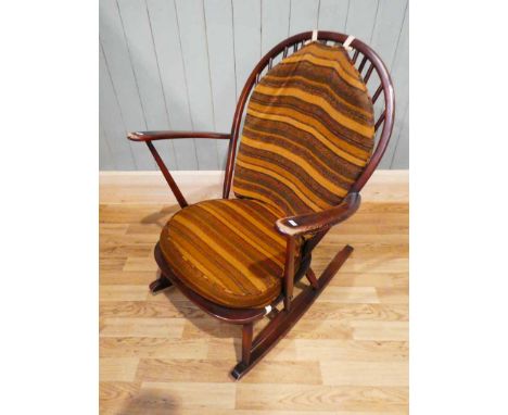 An Ercol stained beech rocking chair