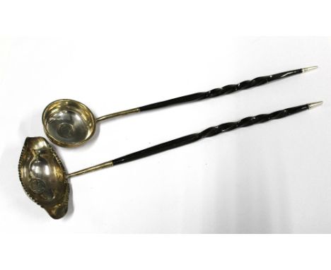 Georgian toddy ladle, white metal coin inset bowl and twisted baleen handle together with another (2) 