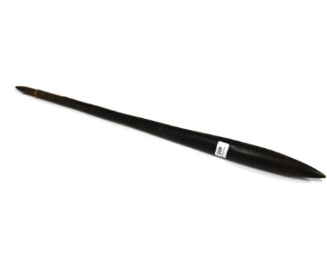 Aboriginal wooden fighting stick, tapering form with chip carved hand grip, 73cm 