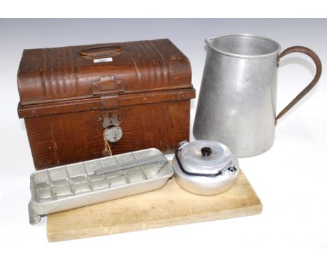 Tin trunk containing a selection of vintage kitchenalia to include a chopping board, metal storage jars and a jug, etc (a lot