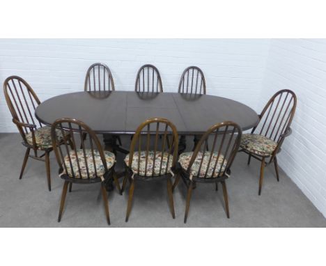 Ercol dark elm dining suite comprising an oval extending table and set of eight Quaker model 365 chairs (9) 163 (closed) 212 