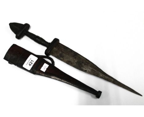 Dagger with a flint to the handle, in a leather sheaf, overall length 40cm 