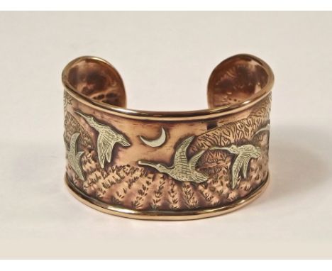 CORNELIUS J VAN DOP. A rare & unusual cuff bangle in mixed metals by Cornelius J Van Dop, showing curlews flying in moonlight