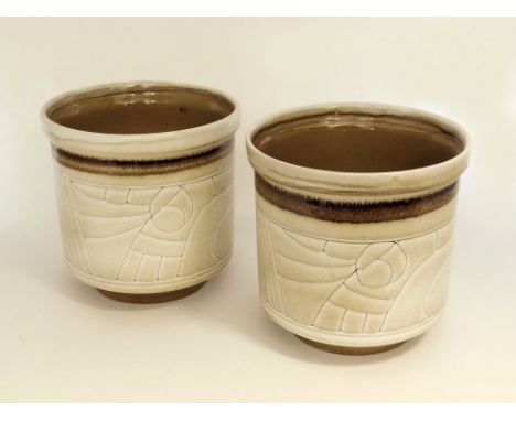 CELTIC POTTERY. A pair of buff Medallion design Celtic Pottery, Newlyn jardinières. Diameter 19. Height 19cm. Condition: Good