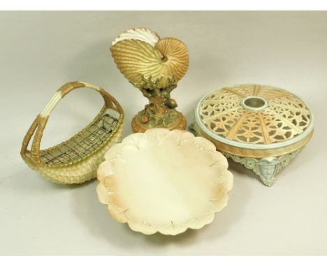 ROYAL WORCESTER. Four pieces of Royal Worcester porcelain: a nautilus shell, 94; a basket; a low comport, 1349 & a reticulate