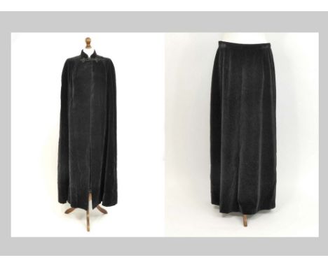 EVENING CLOAK ETC. A black velvet full length evening cloak with frog fastening. Length approx. 135cm. Also, a black velvet f