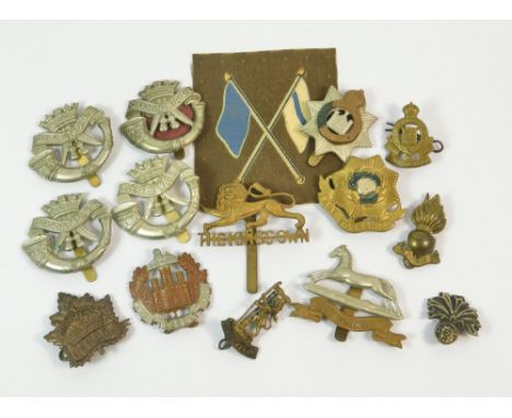 ARMY CAP BADGES ETC. Fifteen regimental badges, including a New Zealand Rifle Brigade & four Cornwall Light Infantry cap badg