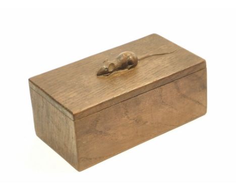 MOUSEMAN BOX. A carved oak Mouseman box by Robert Thompson of Kilburn, with lift-off lid. 17.5 x 9.5cm. WE CAN SHIP THIS LOT,