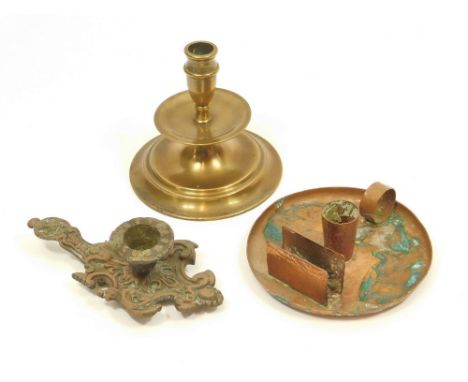 BRASS & COPPER WARE. A single brass candlestick with wide drip tray, a hand crafted copper chamber stick & a cast candle hold