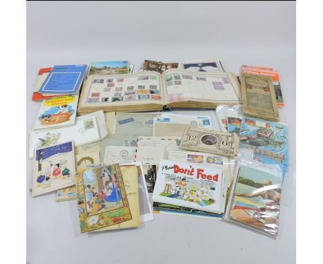 An album of mainly 19th century all world stamps, together with a collection of ordnance survey maps, postcards and Eagle com