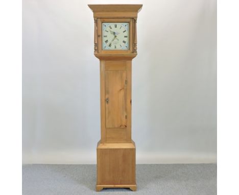 A pine cased longcase clock, with painted dial and thirty hour movement, 201cm tall