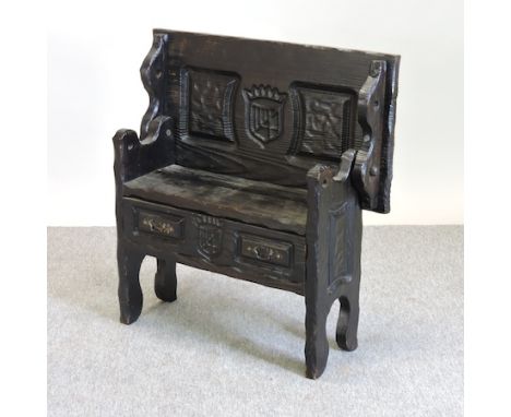 A continental pine carved monks bench, 81cm