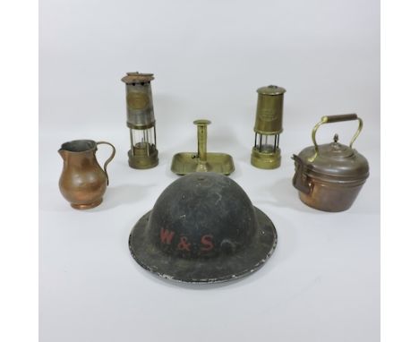 A collection of metalwares, to include a World War II helmet, miner's lanterns, a copper kettle and jug