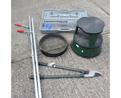 A tile cutter, boxed, together with three loppers, a step and a sieve