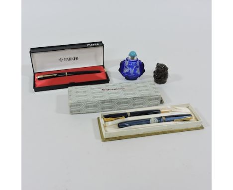A Chinese carved wooden netsuke, 4.5cm tall, together with a Chinese scent bottle, a set of Waterman pens, boxed, together wi