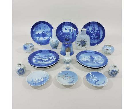 A collection of Royal Copenhagen Christmas plates, together with miniature vases, trinket dishes etc