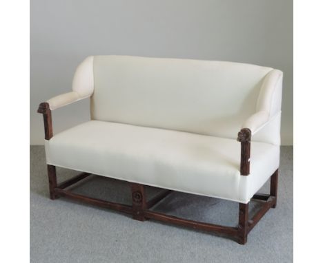 A 19th century carved oak and upholstered sofa, on square legs, 132cm
