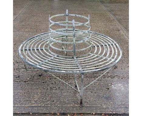 A Regency style white painted metal circular tree bench, 150cm diameter