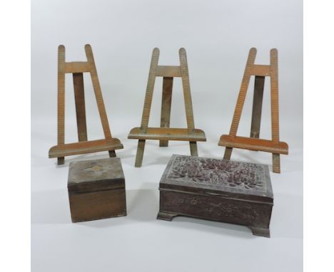 An 18th century tea caddy, together with a Japanese metal box, relief decorated with flowers, 25cm, three carved easel stands