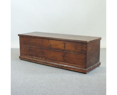 An early 20th century stained pine trunk, 124cm