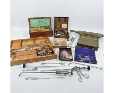 A collection of scientific instruments, to include a blowpipe set, by J. T. Letcher, a set of scalpels, cased, a brass mounte