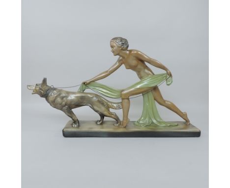 An Art Deco ceramic figure of a lady with dog, 73cm